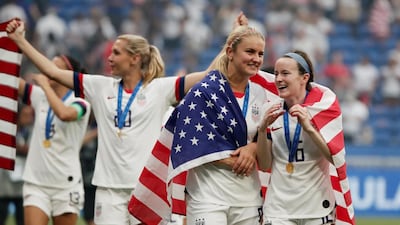 Lindsey Horan and Rose Lavelle celebrate their success. Reuters