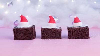 SugarMoo's allergen-free "Crazy Cake" miniature bundle with edible Santa hats. Courtesy of SugarMoo