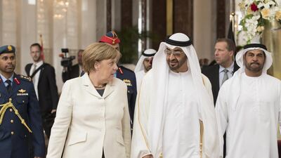Sheikh Mohammed bin Zayed, Crown Prince of Abu Dhabi and Deputy Supreme Commander of the Armed Forces, greets German chancellor Angela Merkel on her arrival in Abu Dhabi for a state visit. Ryan Carter / Crown Prince Court – Abu Dhabi