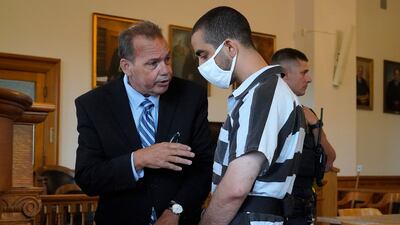 Nathaniel Barone, defence attorney for Hadi Matar, talks with his client. AP