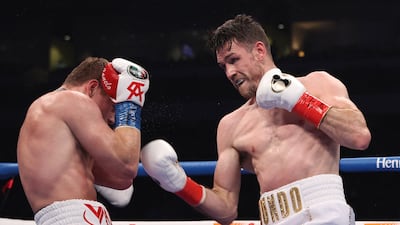 DCanelo Alvarez (red) and Callum Smith during their WBA, WBC and Ring Magazine super middleweight championship bout at the Alamodome in San Antonio. USA Today
