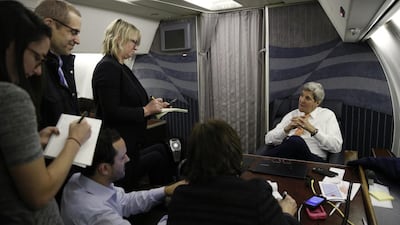 US secretary of state John Kerry briefs journalists as sanctions were being lifted. (Kevin Lamarque / AP)