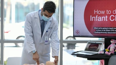 Dr Alshorman performs CPR on a baby child. His hospital treats the vast majority of trauma and road accident victims in Abu Dhabi