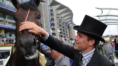 Michael Owen, right, after Brown Panther won The King George V Stakes at Ascot Racecourse on June 16, 2011. Rex Features via AP Images
