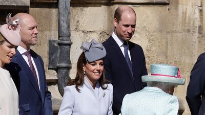 Catherine, Duchess of Sussex curtsies as Queen Elizabeth II arrives for the Easter Sunday service at St George's Chapel in Windsor, England. Getty Images