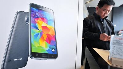 Samsung's Galaxy S5 smartphone started selling in South Korea than its planned release on April 11 worldwide. Jung Yeon-Je / AFP