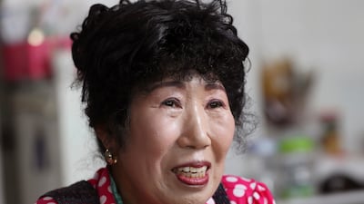 South Korea's unlikely YouTube star, Park Makrye, 70, Despite her new life as a celebrity, she still gets up before dawn to run her restaurant. AP