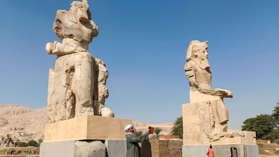 Two alabaster statues of ancient Egyptian King Amenhotep III re-erected at his mortuary temple on Luxor's West Bank in Egypt. Each statue is more than 10 metres tall and weighs about 100 tonnes. EPA