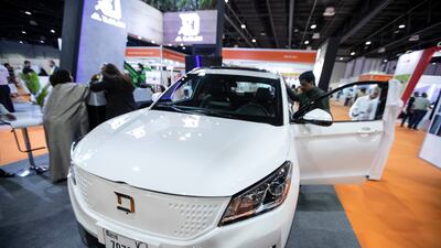 Al Damani electric car on display.