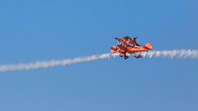 The wingwalkers perform at the Dubai Airshow. Victor Besa for The National.