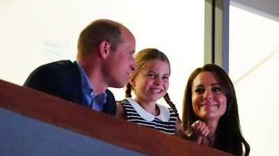 Princess Charlotte with her parents at Sandwell Aquatics Centre on Day 5 of the 2022 Commonwealth Games in Birmingham. PA
