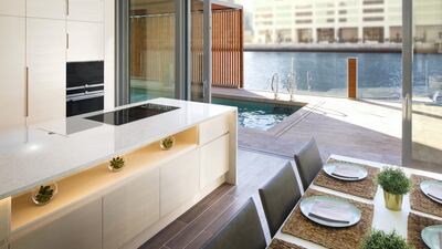 The open-plan kitchen in the two-bedroom water home