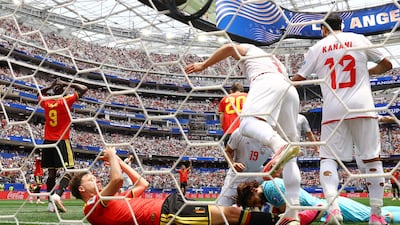 Iran's Hossein Kanani, right, in front of his team's goal. Reuters