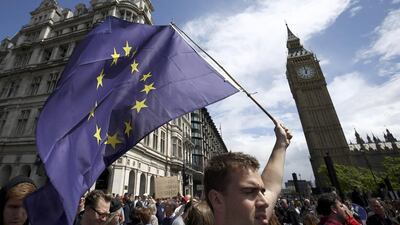 People hold banners during a 'March for Europe' demonstration against Britain's decision to leave the European Union. Neil Hall / Reuters