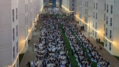 Thousands of Gazans attend an iftar at Emirates Humanitarian City in Abu Dhabi. Victor Besa / The National
