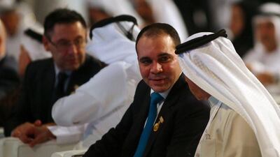 Jordanian Prince and President of Jordan Football Association Ali bin al-Hussein (2R) speaks with an United Arab Emirates official as Barcelona's President Josep Maria Bartomeu (L) speaks with Sheikh Ahmad Bin Rashid al-Maktoum, the son of the ruler of Dubai during the opening session of the 10th edition of Dubai International Sports Conference in Dubai on December 27, 2015. AFP PHOTO / MARWAN NAAMANI