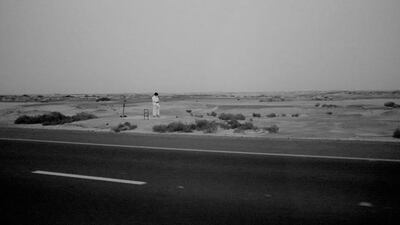 Prayer. Another common sight along the road during the journey. A man taking a quiet moment from his drive to pray.