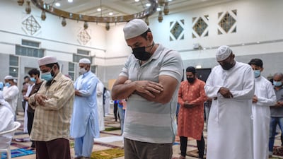 Worshippers at prayer.