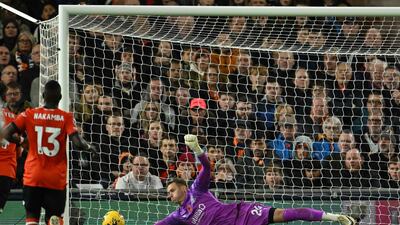 PREMIER LEAGUE TEAM OF THE WEEK (4-4-2): Produced a series of strong saves in the face of constant Liverpool pressure as Luton almost claimed a famous victory, only for Luis Diaz to head home an equaliser in injury time. AFP