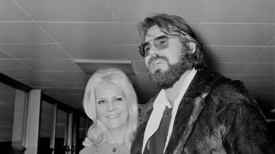 American singer, songwriter, actor, record producer, and entrepreneur Kenny Rogers with his wife Margo Anderson at Heathrow Airport, London, UK, 24th March 1970. Getty Images