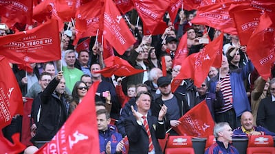 Louis van Gaal manager of Manchester United looks on as the South Stand is unveiled as the newly renamed Sir Bobby Charlton to honour 60 years since his Manchester United debut prior to the Barclays Premier League match between Manchester United and Everton. Getty