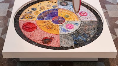 This colourful tapestry is part of 'Luminescence', a survey exhibition of Najat Makki at the Cultural Foundation in Abu Dhabi. Reem Mohammed / The National