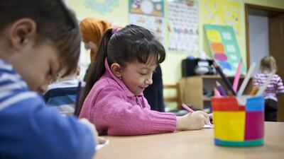 Children at the Donje Rosulje Kindergarten School in Bosnia receive aid through the UAE organisation Dubai Cares, which has partnered with UNICEF to formulate pre-school development programmes. Razan Alzayani / The National