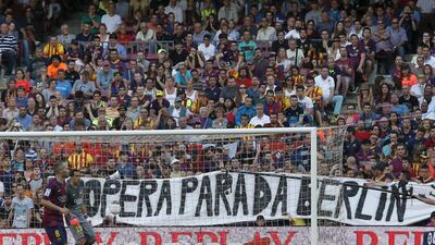 Barcelona's supporters display a banner, which reads: "Next stop Berlin", during the La Liga contest against Real Sociedad on Saturday at the Camp Nou. Gustau Nacarino / Reuters
