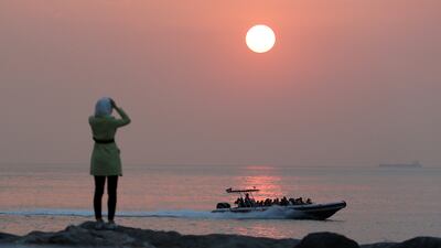 It will be a hot start to the Eid Al Adha holiday before temperatures ease off for the weekend. Pawan Singh / The National