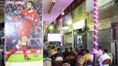 Liverpool fans celebrate in Cairo. Adham Youssef