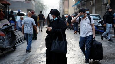 People leave the area of the attack in Basta. Reuters