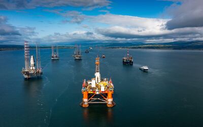 North Sea oil and gas platforms and drilling rigs in Nigg Bay, Scotland. 'The transition to net zero will be the biggest engineering project this country has seen,' said David Whitehouse, chief executive of Offshore Energies UK. Alamy