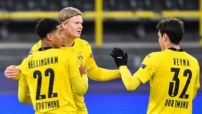 Erling Braut Haaland celebrates with teammates after scoring his second goal for Borussia Dortmund against Club Brugge. AP Photo