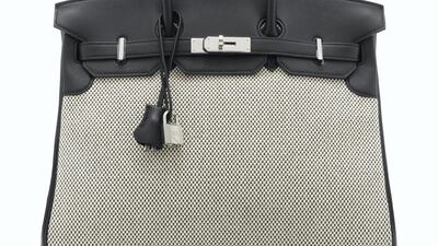 A limited edition Black Swift leather and Ecru Toile criss cross canvas Birkin 35 with palladium hardware. Estimate: £5,000 - 7,000. Courtesy Christie's