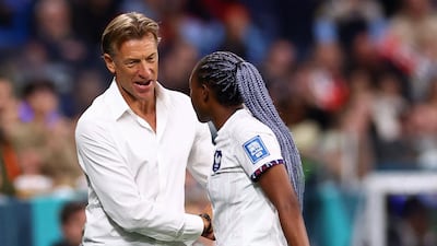 France's Kadidiatou Diani shakes hands with coach Herve Renard after being substituted in the game against Panama. Reuters