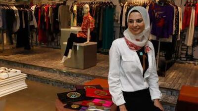 Zeina Abou-Chaaban with some of the Palestyle designs, whose sale give Palestinian women in refugee camps an income.