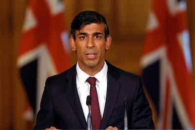 Britain's Chancellor of the Exchequer Rishi Sunak unveiled new economic measures to combat the effects of Covid-19 on Thursday. AFP