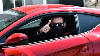 Juventus' Italian defender Leonardo Bonucci, wearing a face mask, arrives for duty. AFP