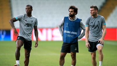 Liverpool's Georginio Wijnaldum (left to right), Mohamed Salah and James Milner during the training session at Besiktas Park, Istanbul. PA Wire
