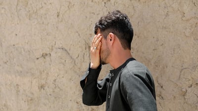 Mirwais Elmi outside his house in Kabul. Reuters