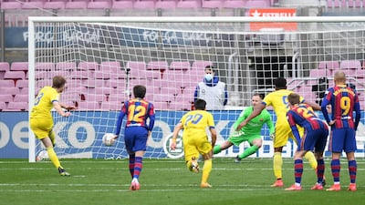 Cadiz's Alex Fernandez sends Barca goalkeeper Marc-Andre ter Stegen the wrong way from the penalty spot to earn his team a point. Getty