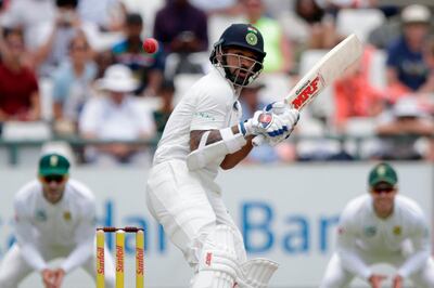 Shikhar Dhawan was found waiting while facing the short stuff from South Africa. Gianluigi Guercia / AFP