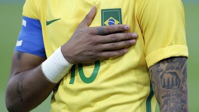 Brazil’s Neymar sings the national anthem before the final match of the men’s Olympic football tournament between Brazil and Germany at Maracana stadium in Rio de Janeiro, Brazil, Saturday, August 20, 2016. Leo Correa / AP Photo