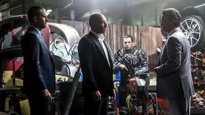 From left, Paul Walker, Vin Diesel, and Kurt Russell in Furious 7. Courtesy Universal Pictures