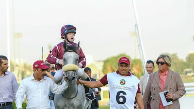 Jaci Wickham, right, alongside her winner Marwa W’Rsan with Sam Hitchcott in the saddle. Courtesy Abu Dhabi Equestrian Club