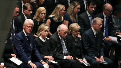 Former US President Bill Clinton, former Secretary of State Hillary Clinton, former US Vice President Dick Cheney, Lynne Cheney, and former US Vice President Al Gore sit for the funeral service. Getty Images/AFP