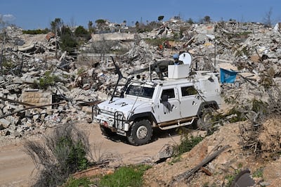 Unifil soldiers patrol past the rubble of destroyed buildings following the Israeli forces' withdrawal from the Kfar Kila village in southern Lebanon on February 18, 2025. EPA