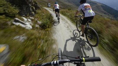 Switzerland's Thomas Tanner, left, and Charly Meier in action during the first stage of the Swiss Epic Race on Monday. Maxime Schmid / EPA