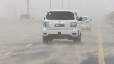 Traffic during a dust storm on Al Qudra Road in Dubai. Pawan Singh / The National