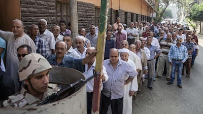 Many view the vote as a referendum on stability versus the freedoms promised by the Arab Spring-inspired popular uprising that ousted veteran strongman Hosni Mubarak in 2011. Mahmoud Khaled/AFP Photo